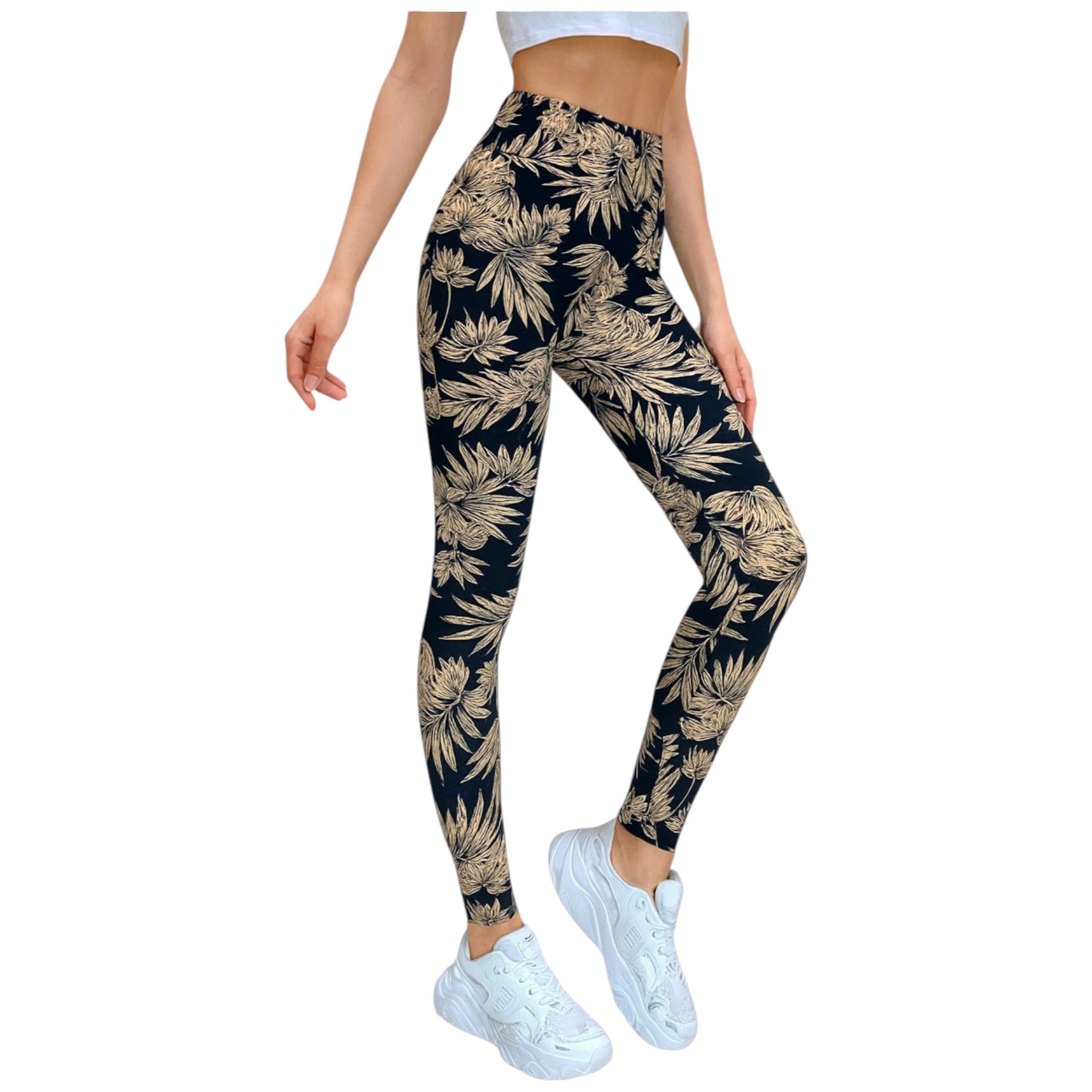 Women's black leggings with beige tropical leaf print, full-length stretch fit.